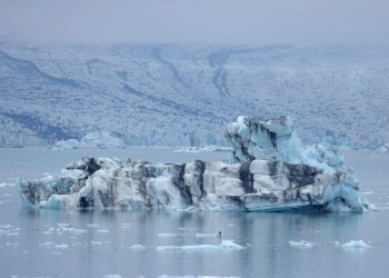 Ice cave collapse kills tourist as rescuers search for two missing in Iceland