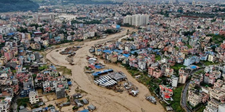 Rescuers use zip lines and boats to reach survivors as Nepal flooding and landslides kill nearly 200 people