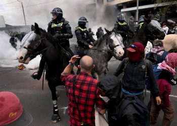 Protesters clash with police at Australia defense show