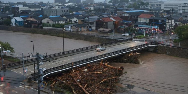 This Japanese region is still recovering from a deadly earthquake. Now record rains have flooded its streets