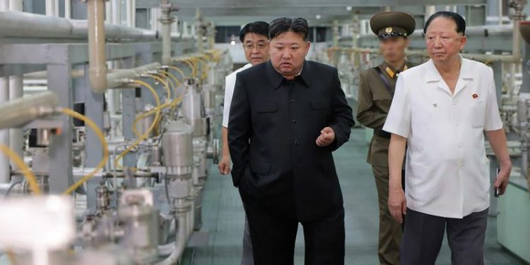 North Korea releases images of Kim Jong Un visiting a uranium enrichment site, giving rare glimpse inside its nuclear program