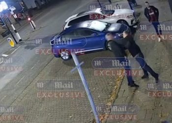 British lawmaker suspended after video shows him allegedly punching man in the street