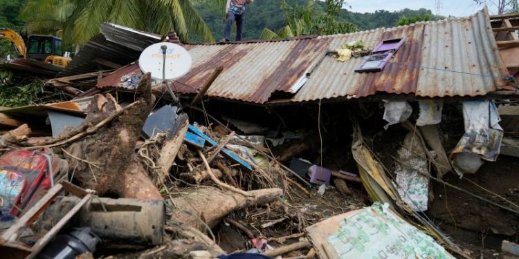 At least 126 dead and missing in massive flooding and landslides in Philippines