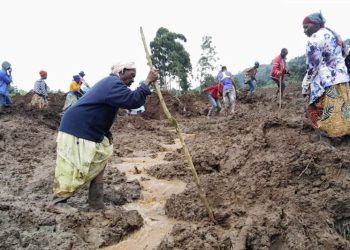 At least 15 killed and more than 100 missing after landslides bury homes in Uganda