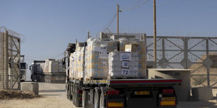 Nearly a hundred aid trucks looted in Gaza, as UN warns of ‘collapse of law and order’