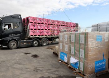 Israeli strikes kill at least 200 in Gaza as UN halts aid deliveries after more trucks stolen