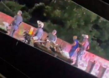 Video of military police officer throwing man off bridge sparks anger in Brazil