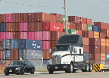 Potentially crippling port strike averted after dockworkers, ports and shipping companies reach a tentative deal