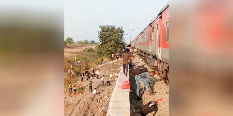 Rail accident kills 12 in western India after passengers jump onto tracks over fire alert