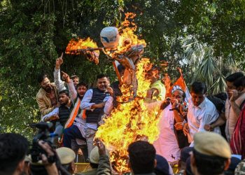 ‘Treated like criminals’: Shackling of Indians aboard 40-hour migrant flight sparks new outrage against Trump