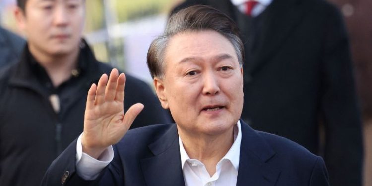 South Korea’s impeached President Yoon freed from detention but faces ongoing trials