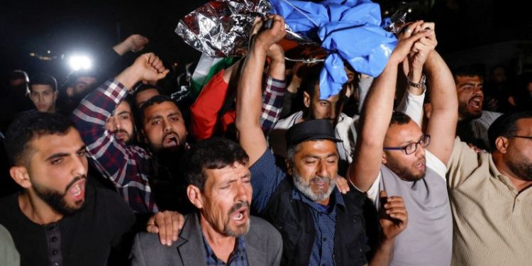 Palestinian American teen killed by Israeli soldiers in West Bank, official says