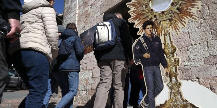 Auctioning off millennial saint-to-be’s relics is Satan’s work, archbishop says