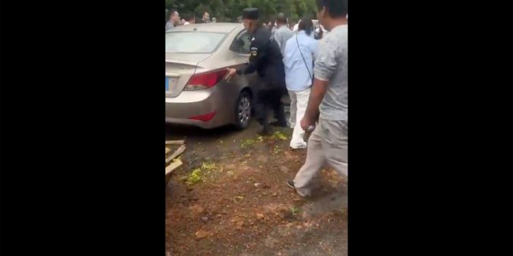 Car plows into crowd outside school in eastern China, injuring multiple people