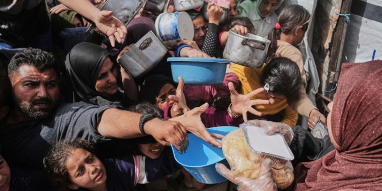 Israel, US in talks to resume aid deliveries to Gaza as famine looms, source says