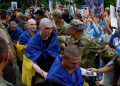Soldiers return home after years in captivity as Ukraine-Russia prisoner swap begins