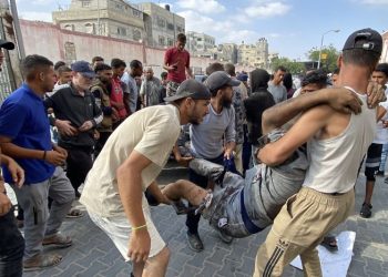 Dozens killed by Israeli fire as they sought desperately needed aid in Gaza, Palestinian health ministry says